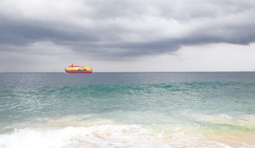 Little red boat on White Sand beach